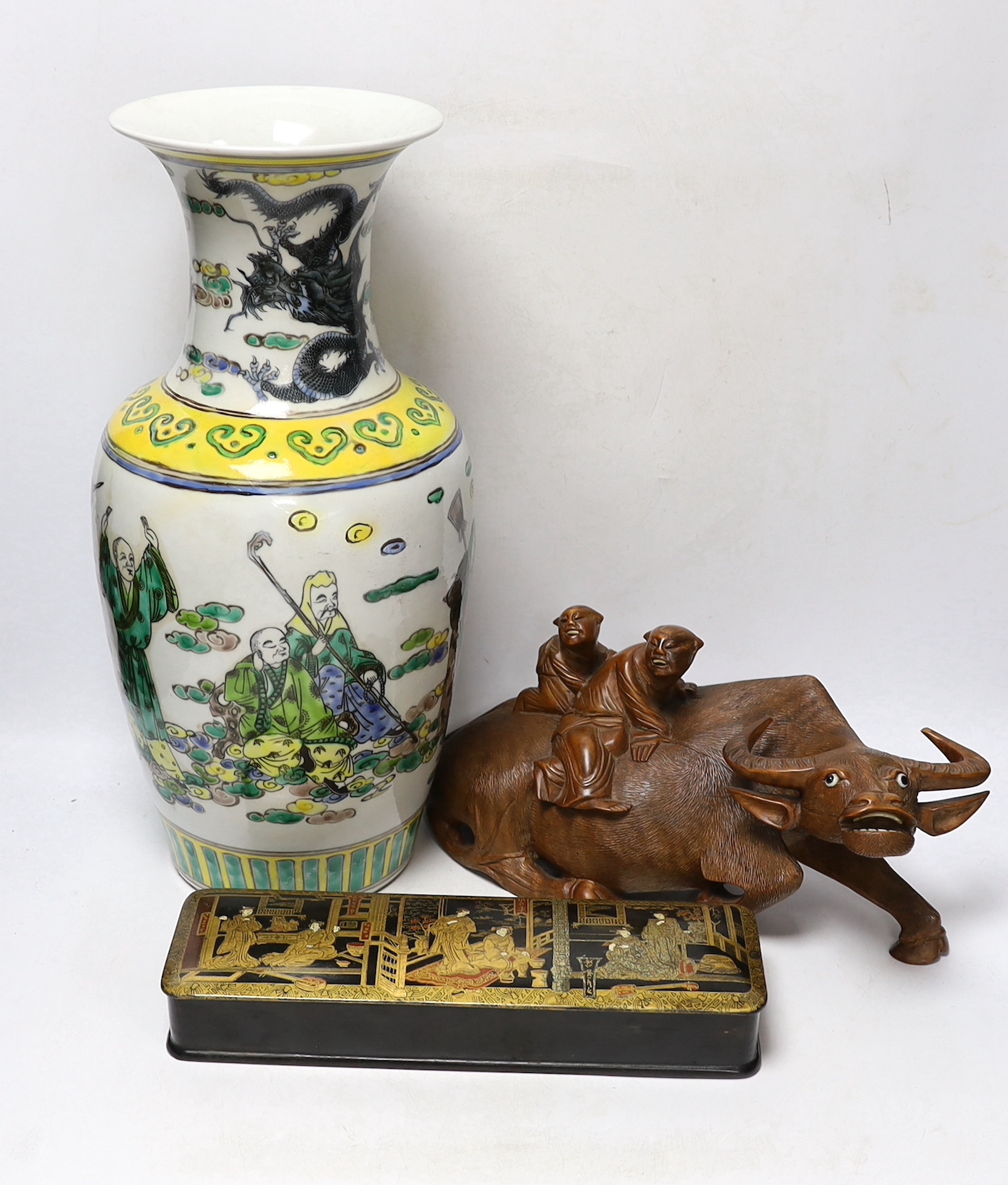 A Chinese famille verte vase, a papier-mâché box and a Chinese hardwood carving of an ox, tallest 42cm